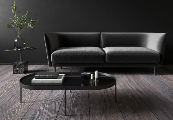 Black minimalistic interior with sofa and coffee table. 3d render illustration mock up.